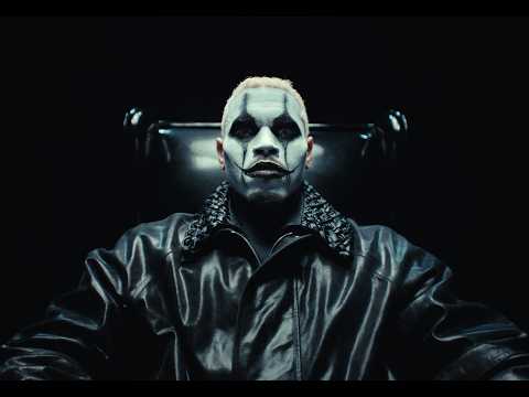 Chris Brown Brings Rock-Star Chaos to “For The Moment” Video